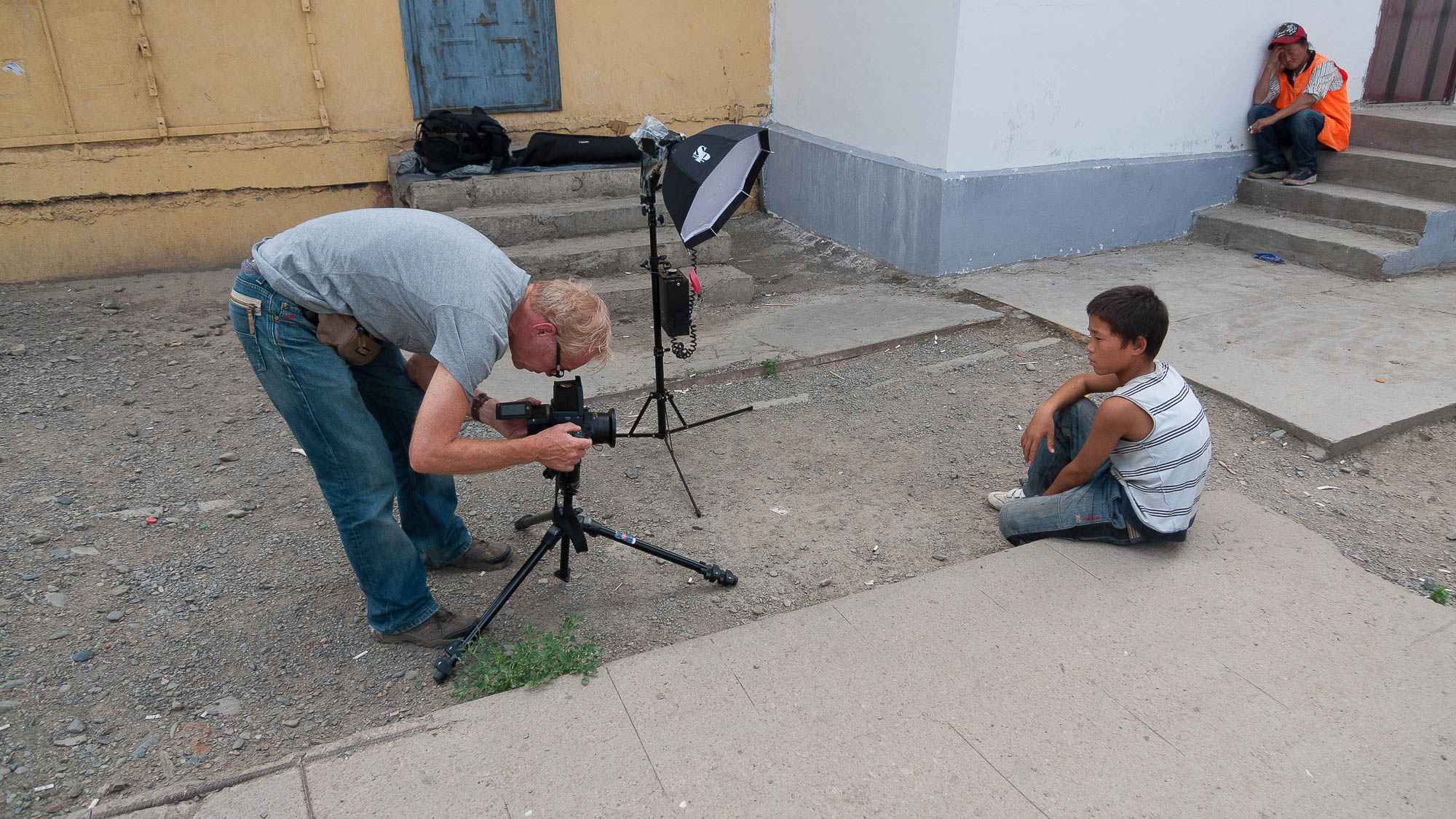 Making a portrait of street boyl in Ulaanbaatar
