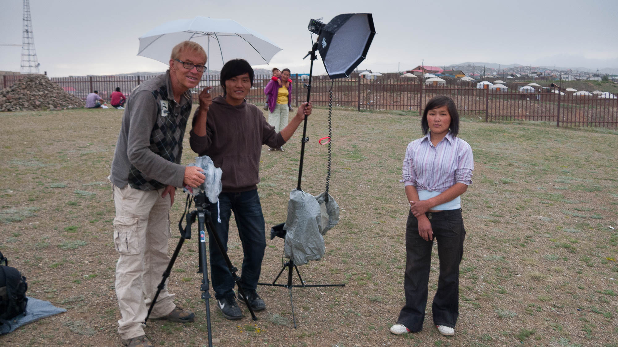 posing with assistant and street girl in Ullanbaatar