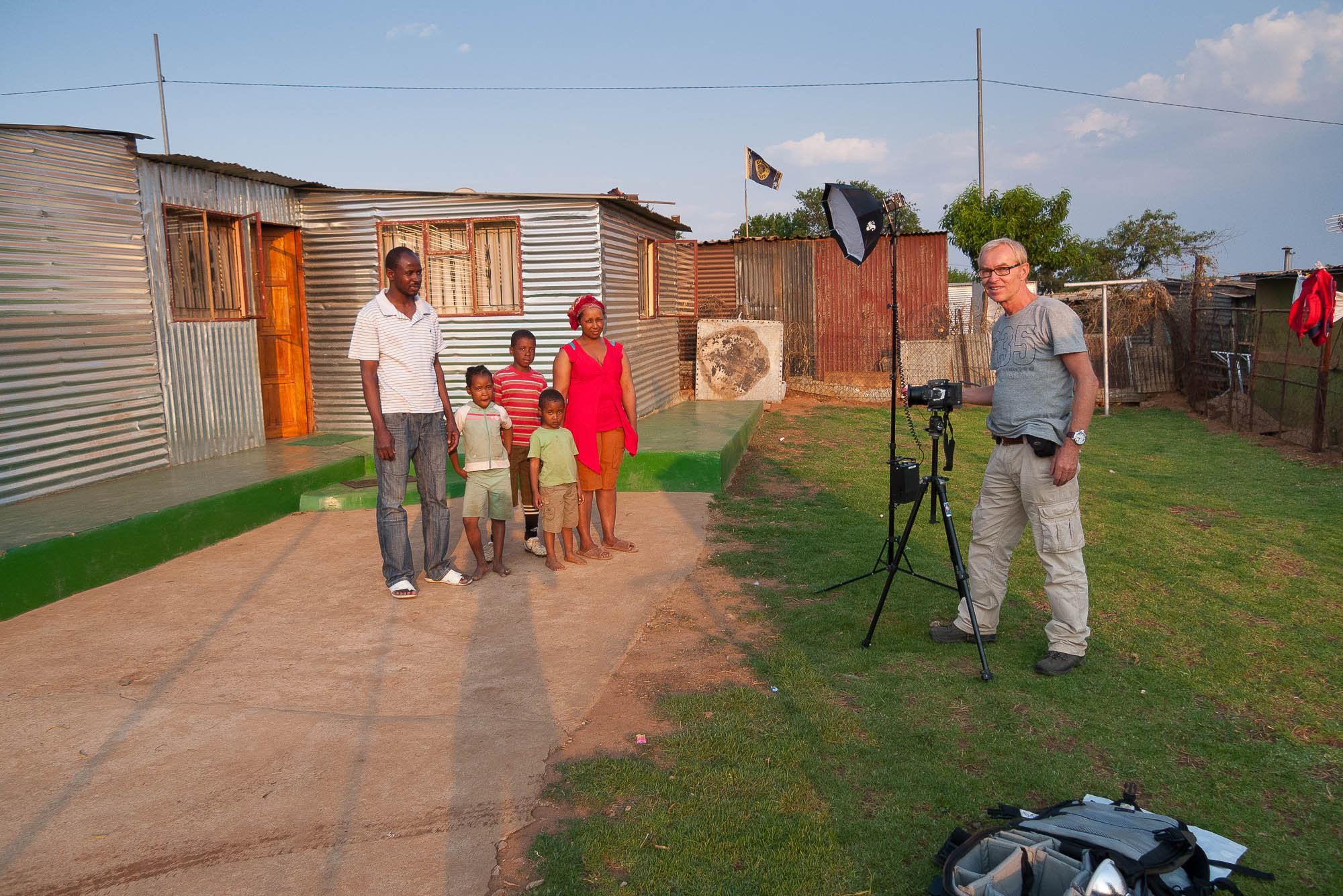 in Motsaoledi making portraits of a family
